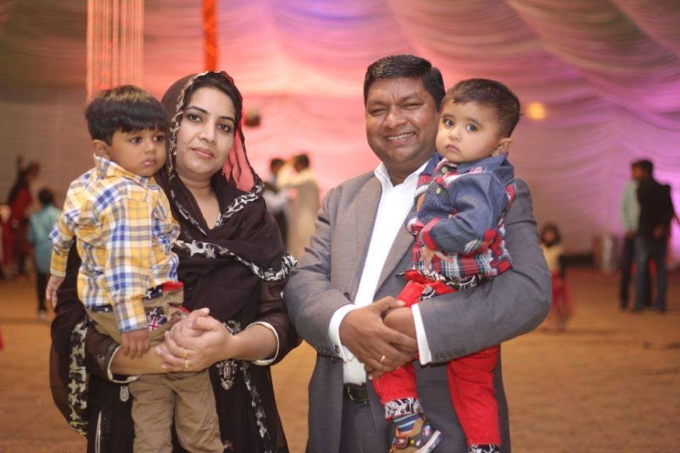 A family sharing their testimony